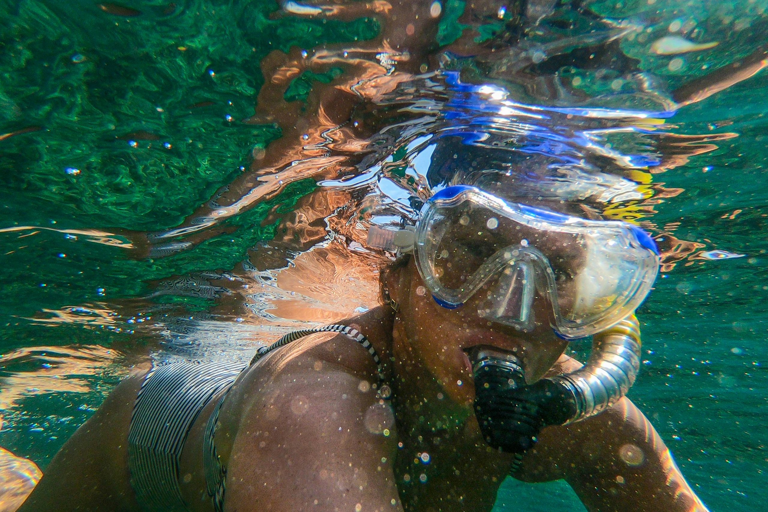 woman snorkeling underwater